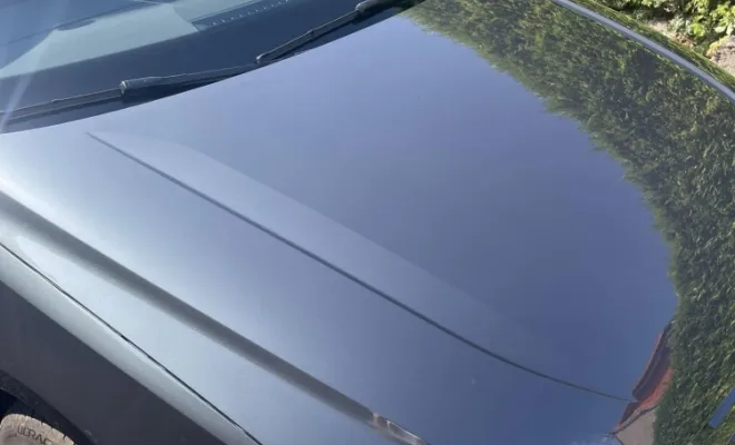 Apres débosselage sans peinture capot AUDI A1